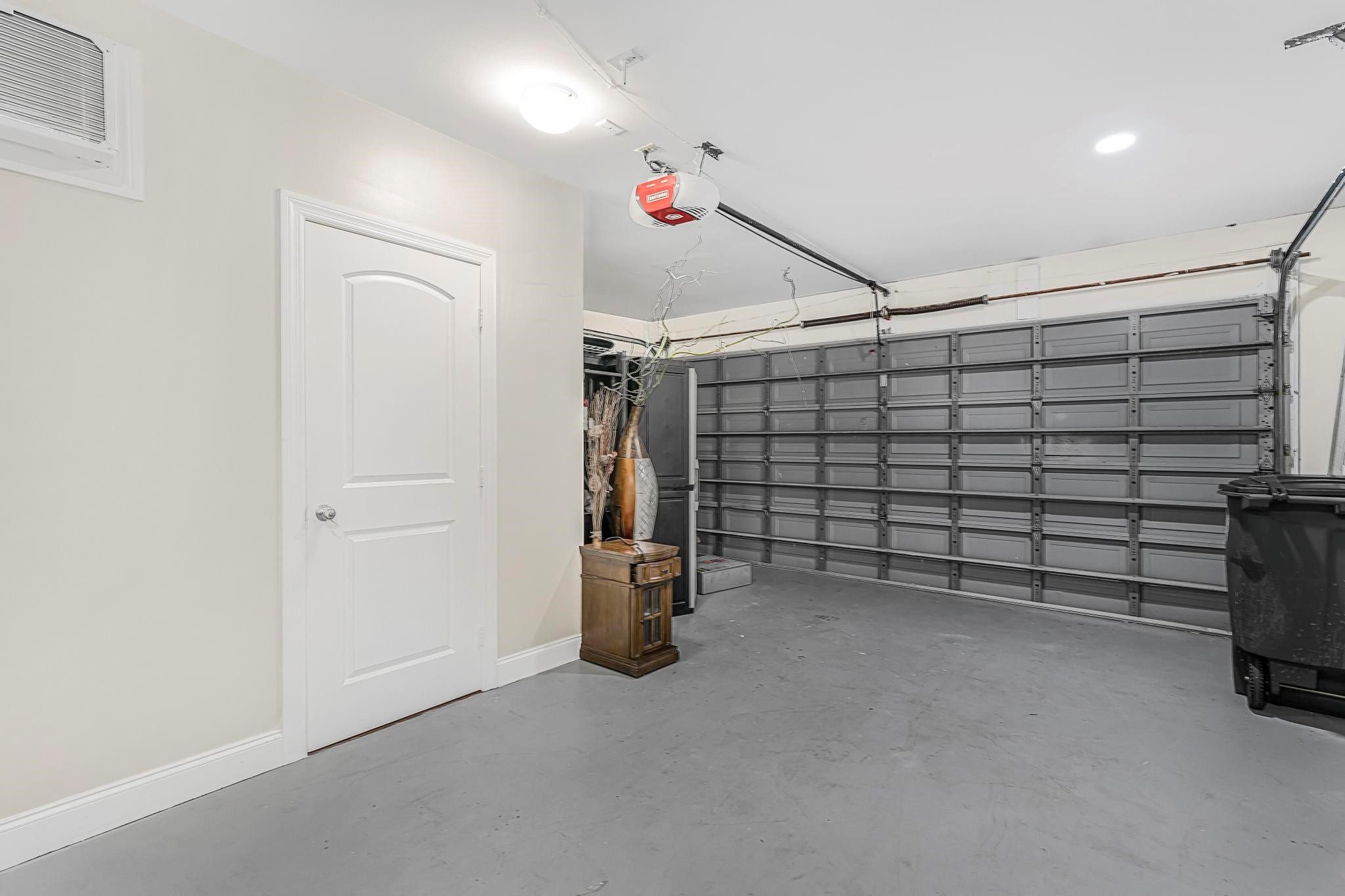 3374 Northwest 27th Terrace Boca Raton, FL 33434 - Photo 27 of 33 a view of a garage