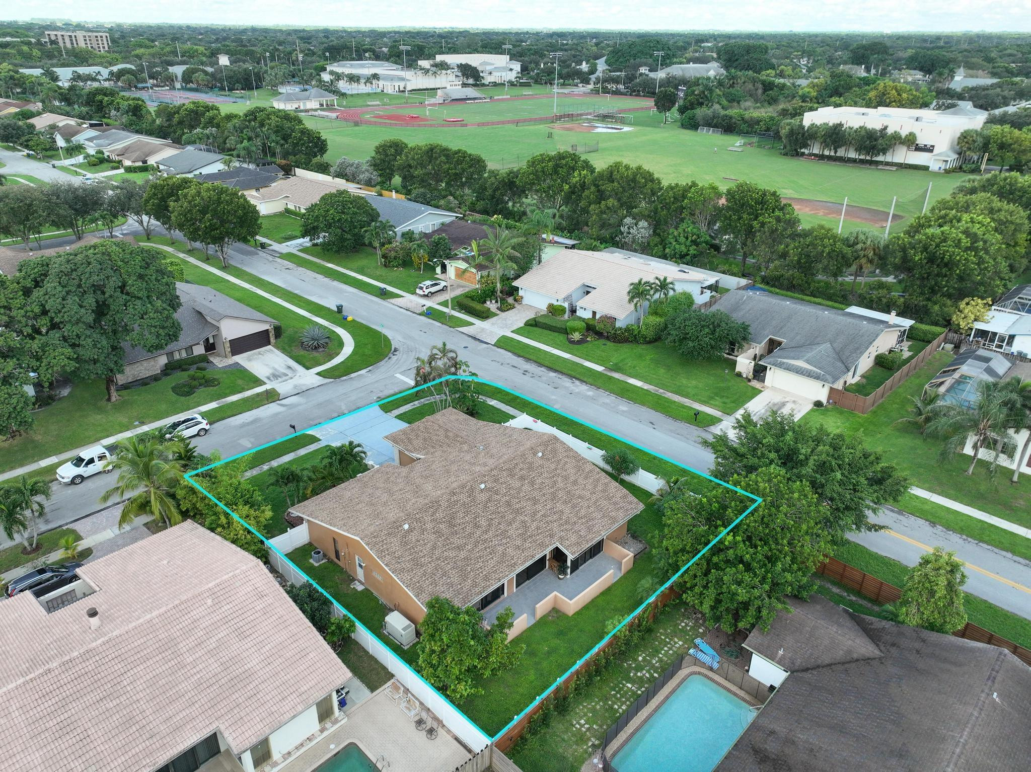 3374 Northwest 27th Terrace Boca Raton, FL 33434 - Photo 3 of 33 an aerial view of a house