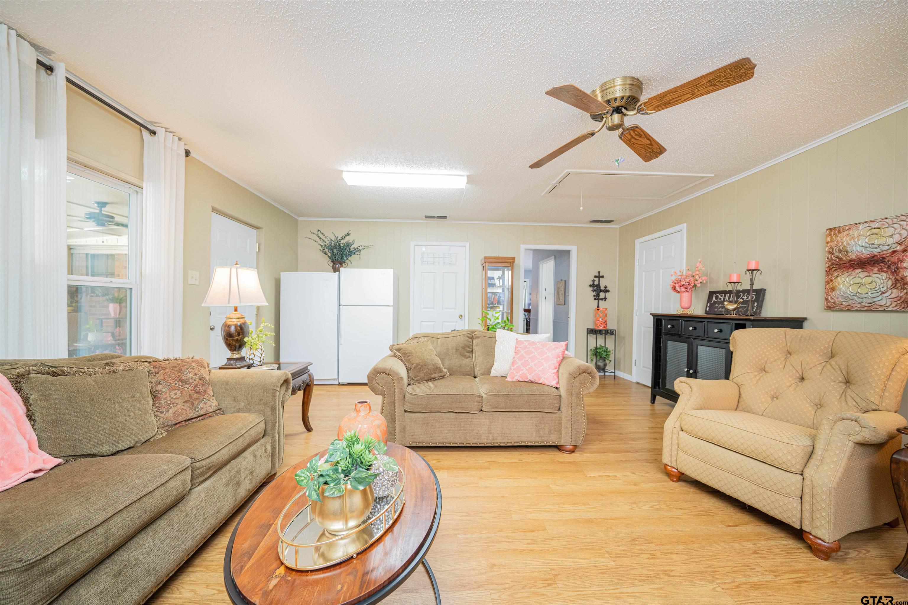 209 Cheryl Street Longview, TX 75604 - Photo 24 of 41 a living room with furniture and a large window