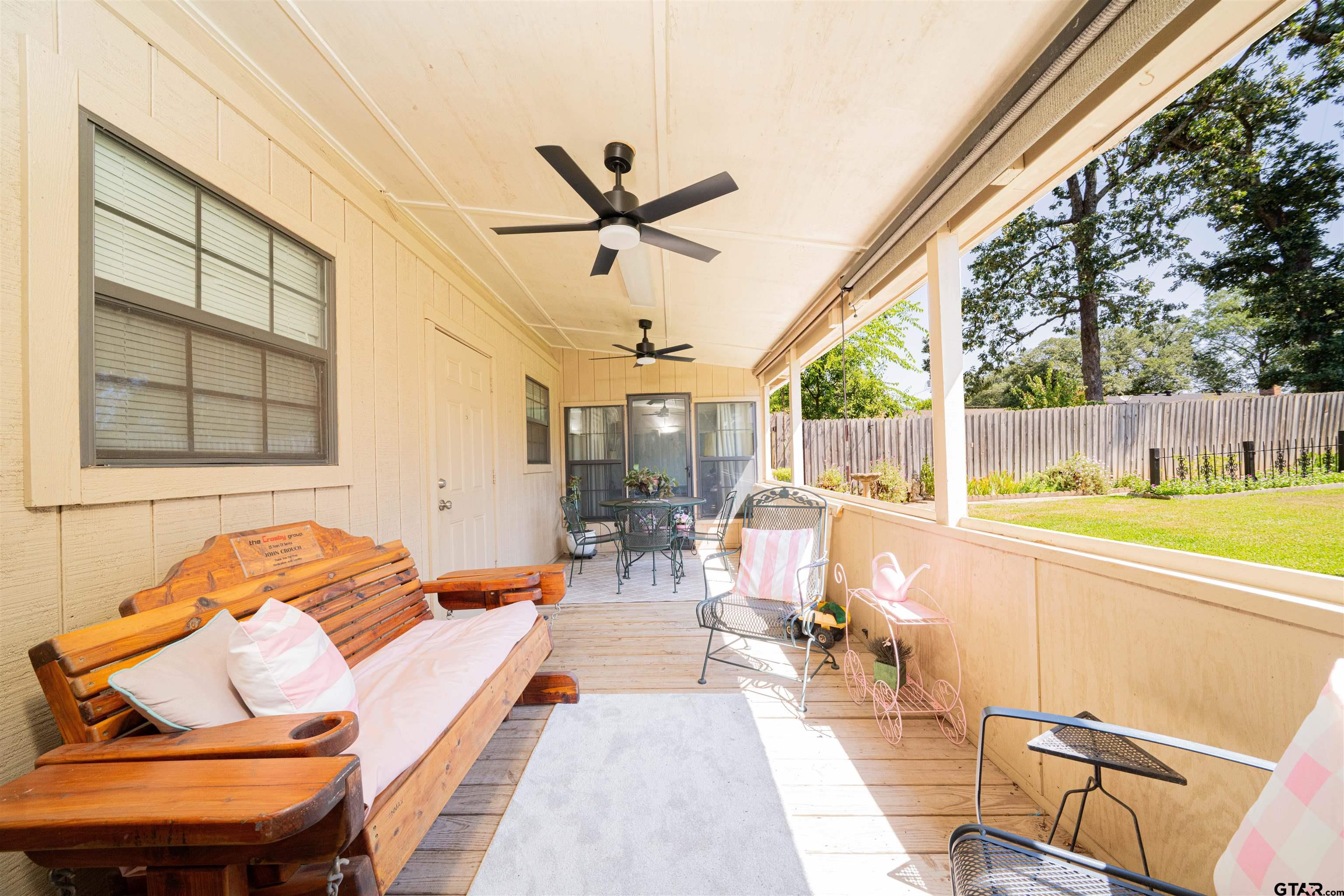 209 Cheryl Street Longview, TX 75604 - Photo 28 of 41 a outdoor space with the couches and kitchen view