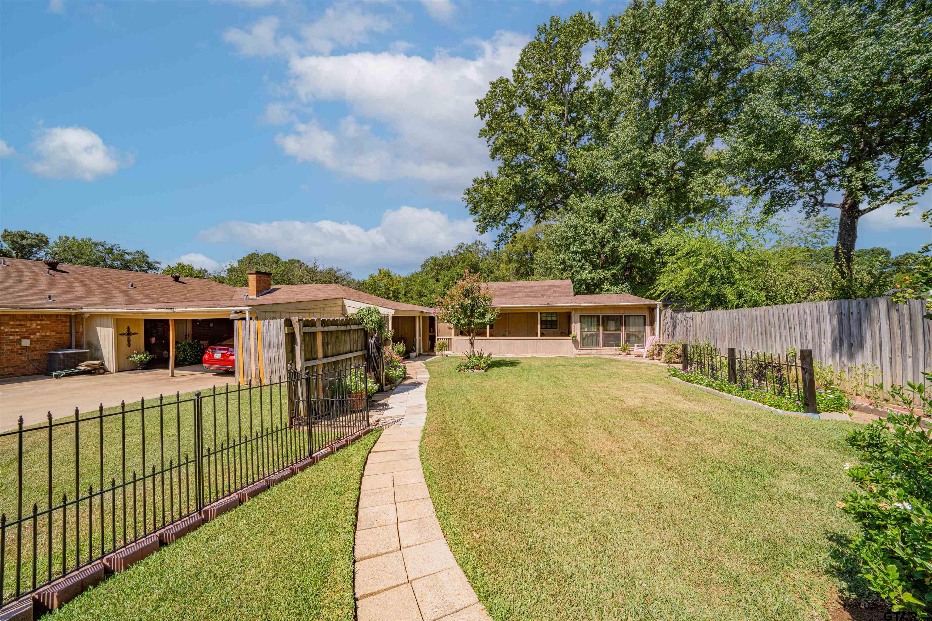 209 Cheryl Street Longview, TX 75604 - Photo 36 of 41 a front view of a house with a yard