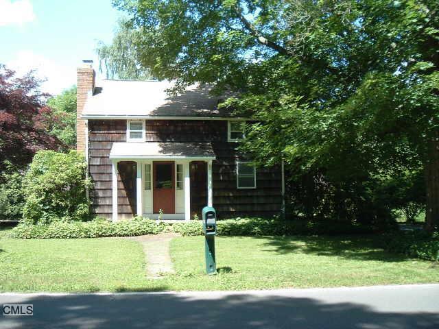487 Wheeler Road Monroe, CT 06468 - Photo 1 of 1 a front view of a house with a yard