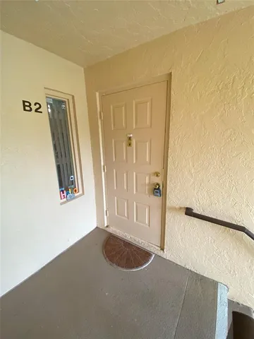 a view of a hallway with closet