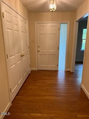 a view of a livingroom with wooden floor