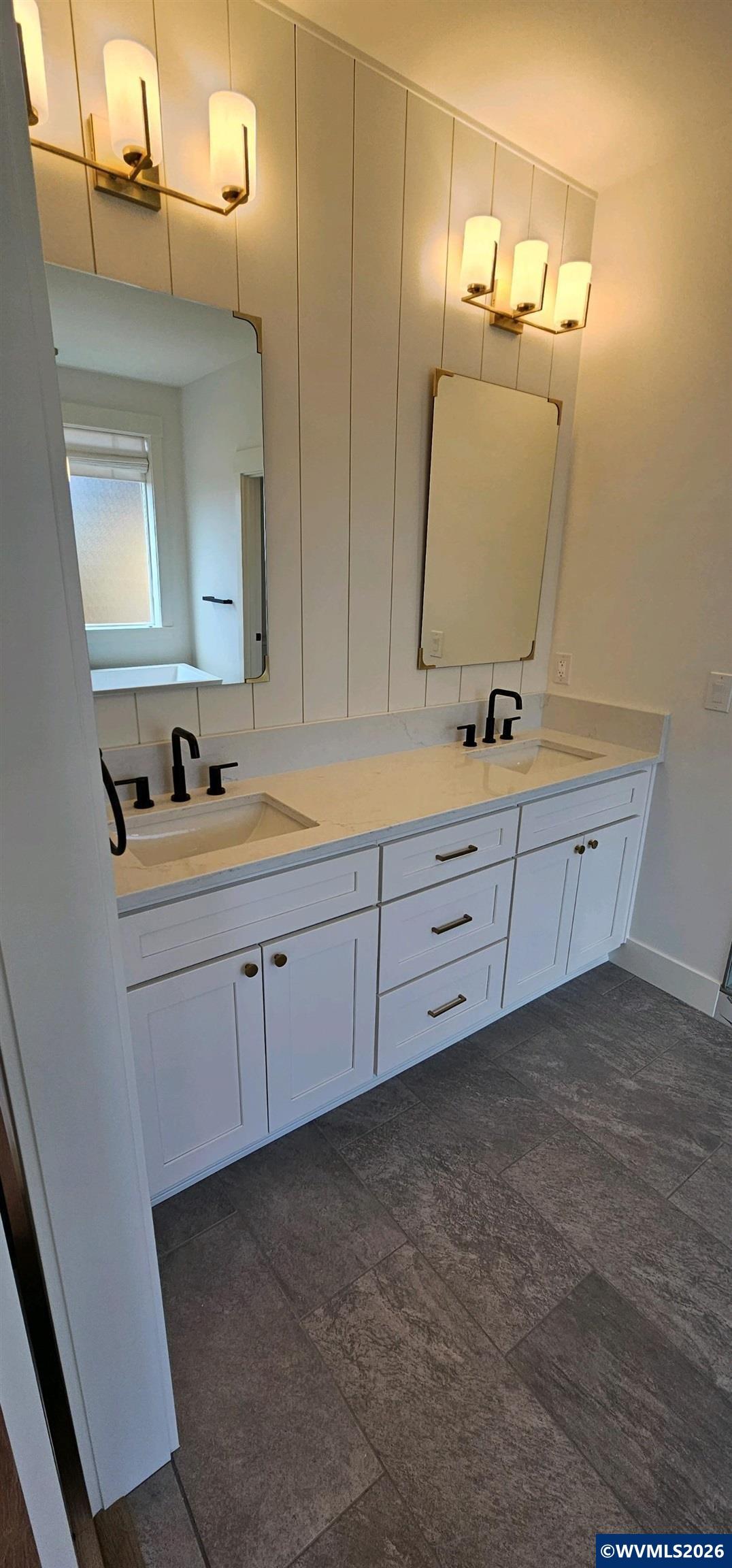 Model B Salishan Street Southeast Salem, OR 97302 - Photo 13 of 30 a bathroom with a sink and a mirror