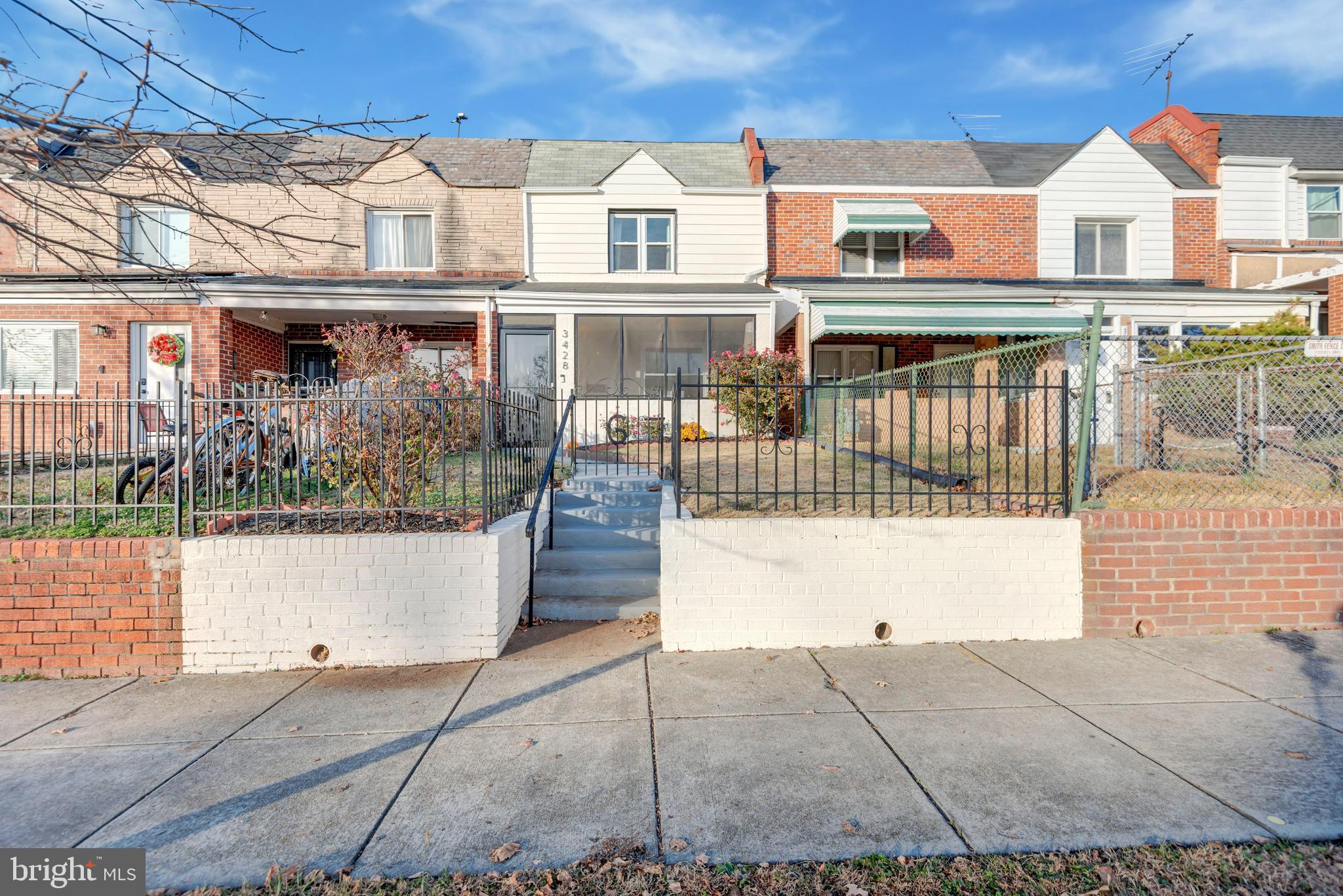 3428 Dix Street Northeast Washington, DC 20019 - Photo 2 of 21 a view of multiple houses with a street
