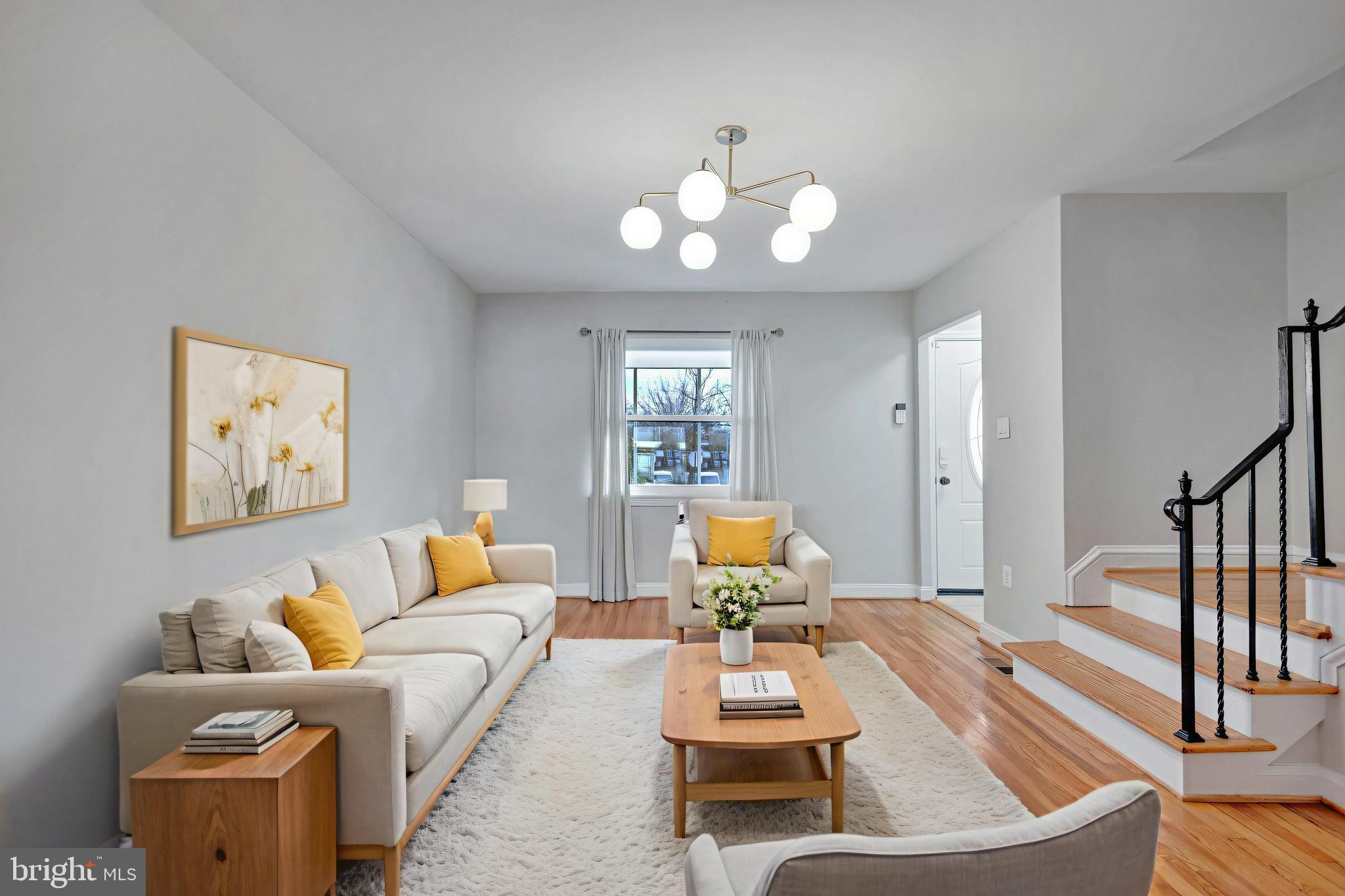 3428 Dix Street Northeast Washington, DC 20019 - Photo 4 of 21 a living room with furniture and wooden floor