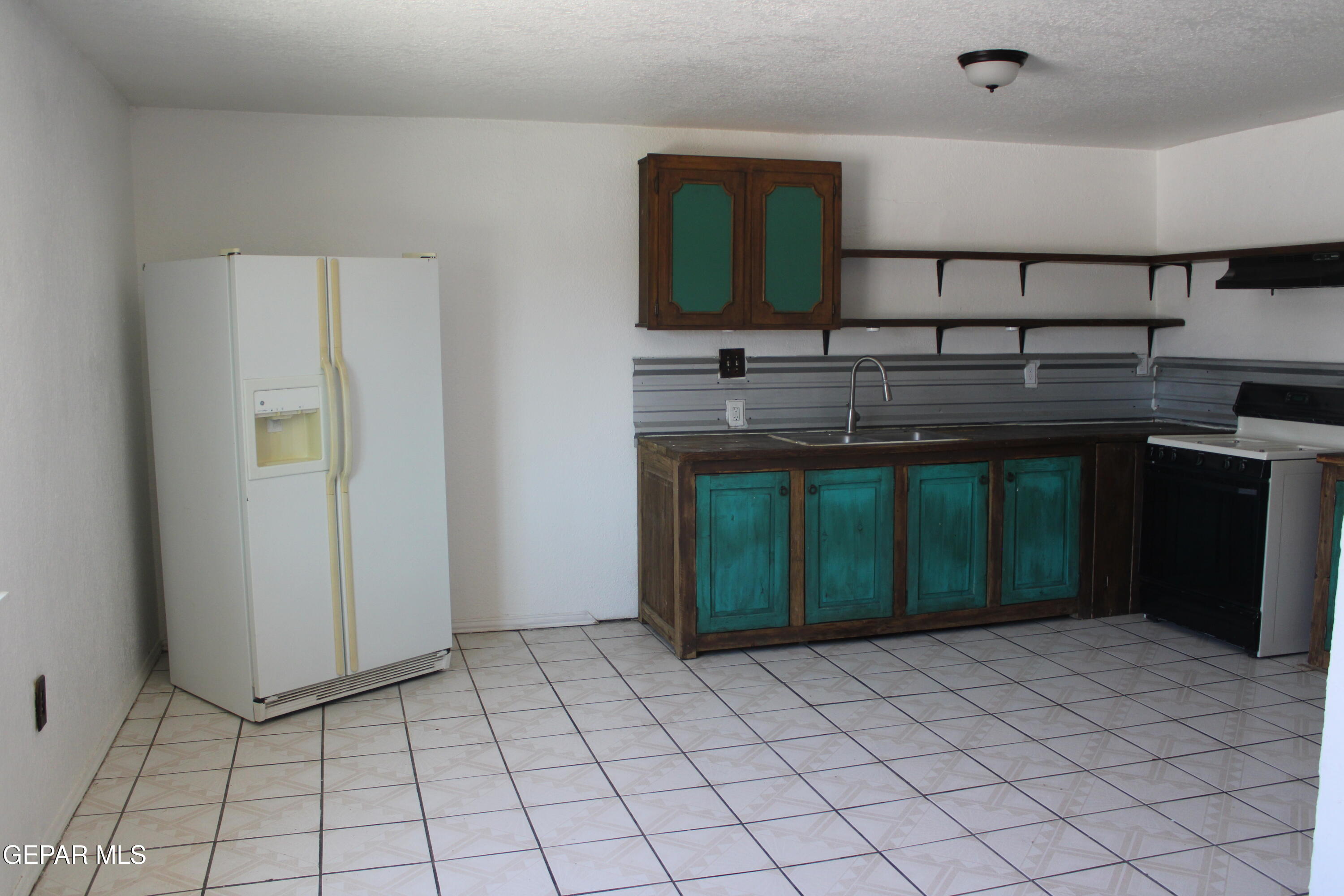 1368 Reid Road, Unit B Socorro, TX 79927 - Photo 6 of 13 IMG_4618