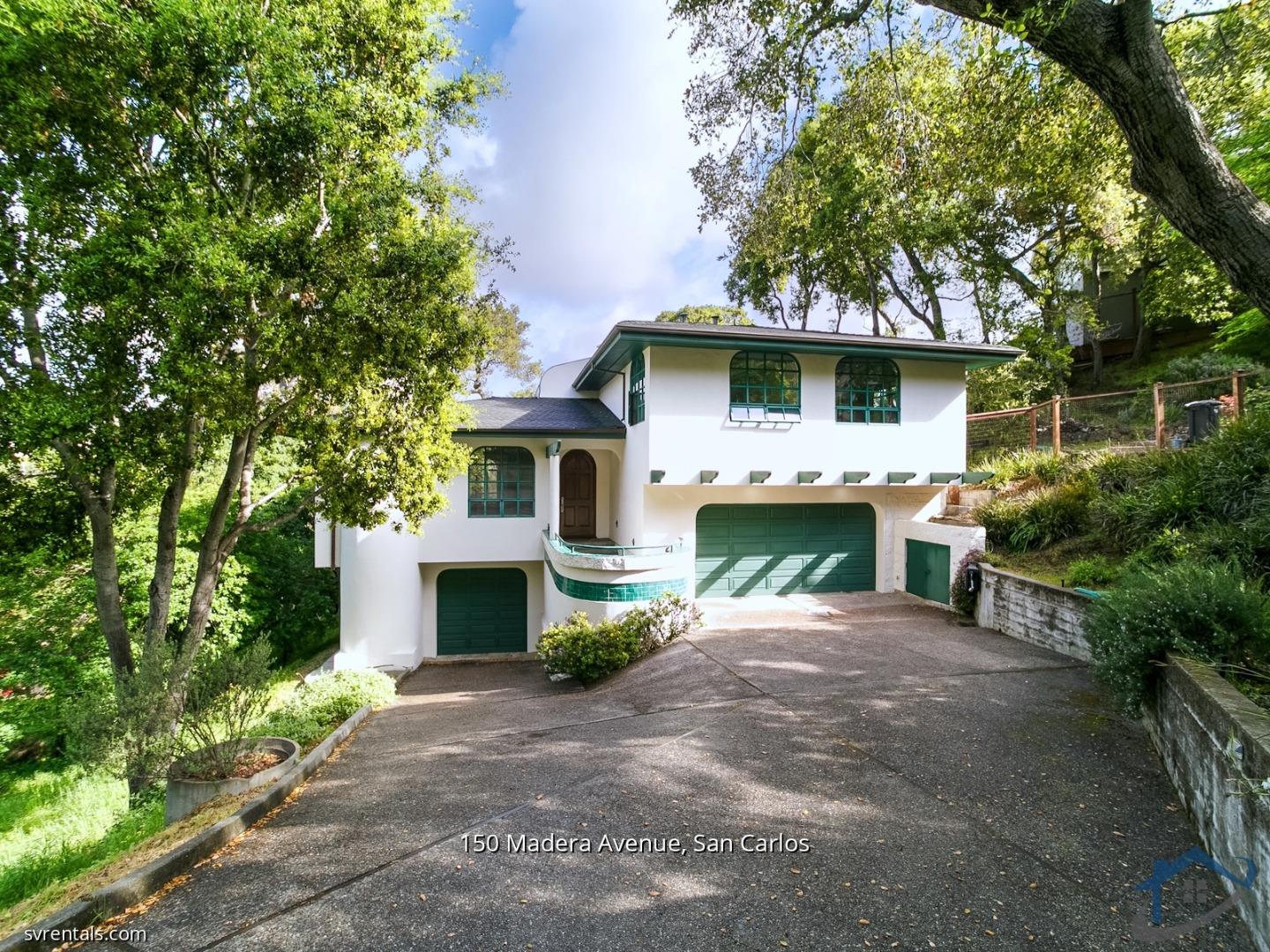 150 Madera Avenue San Carlos, CA 94070 - Photo 1 of 23 a front view of a house with a garden