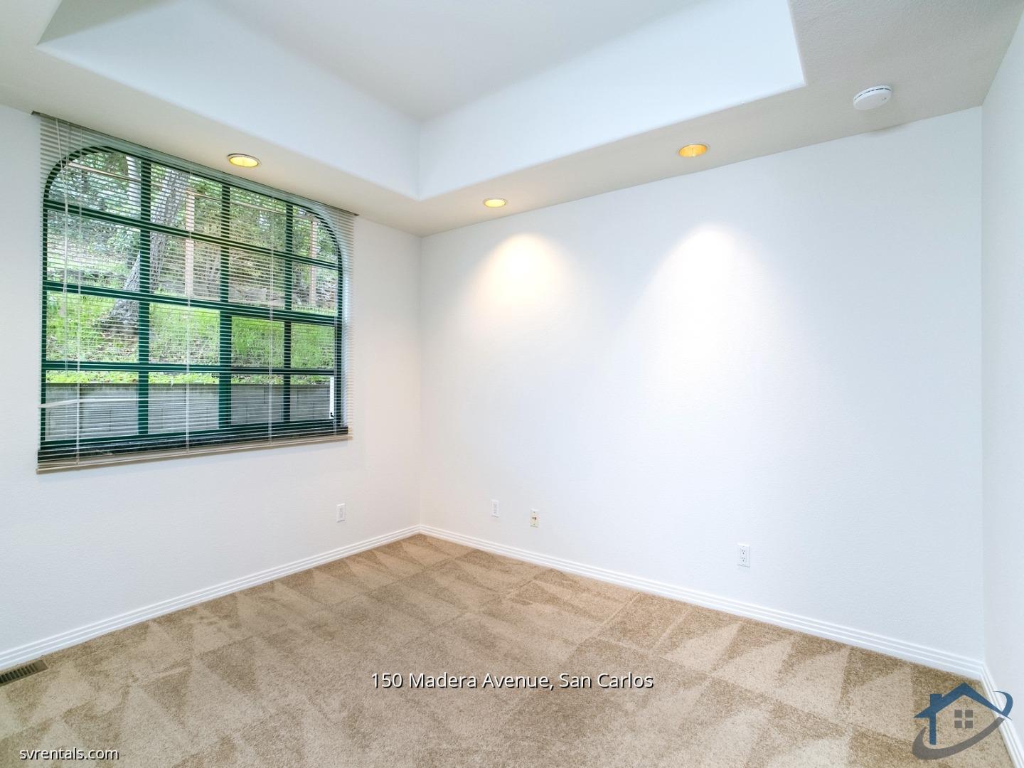150 Madera Avenue San Carlos, CA 94070 - Photo 11 of 23 an empty room with a window