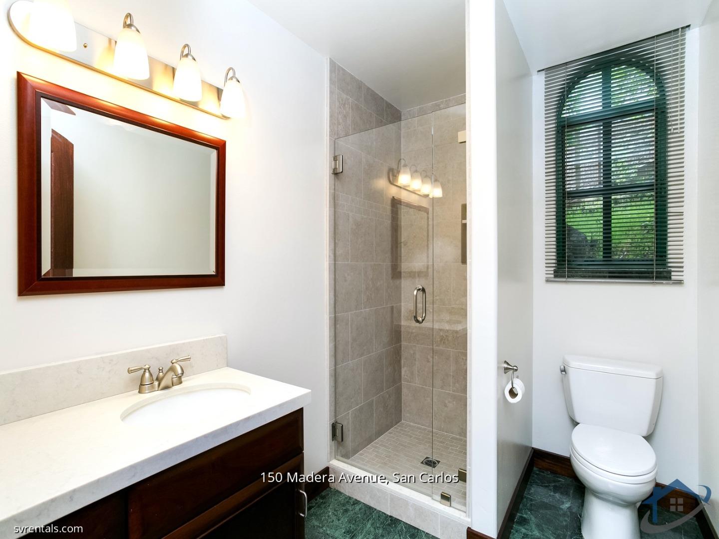 150 Madera Avenue San Carlos, CA 94070 - Photo 13 of 23 a bathroom with a sink a toilet and shower