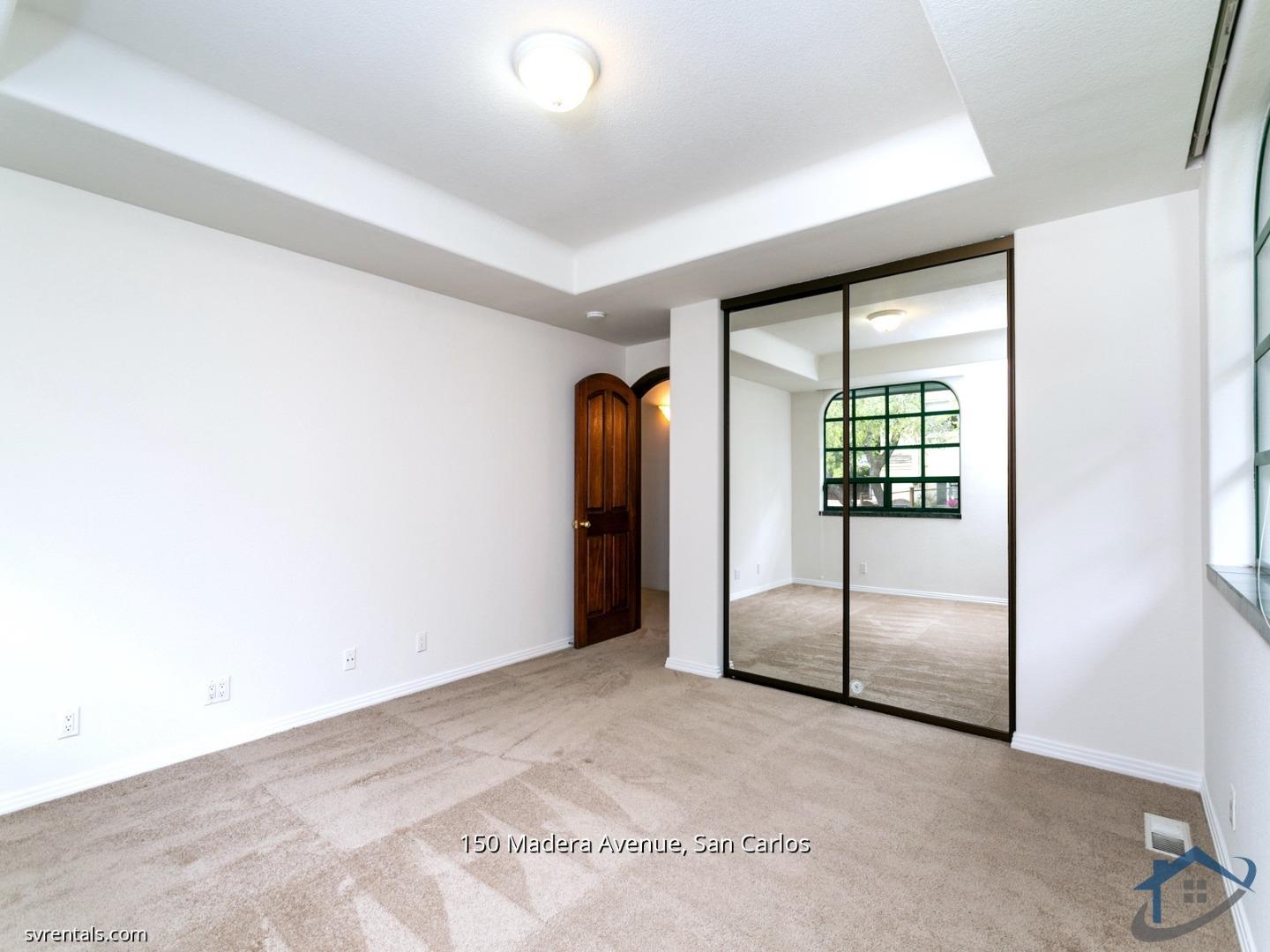 150 Madera Avenue San Carlos, CA 94070 - Photo 15 of 23 an empty room with sliding glass door and shower