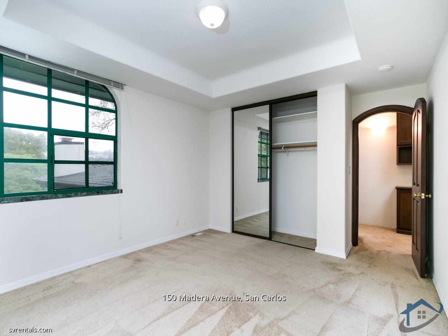 150 Madera Avenue San Carlos, CA 94070 - Photo 18 of 23 an empty room with windows and closet
