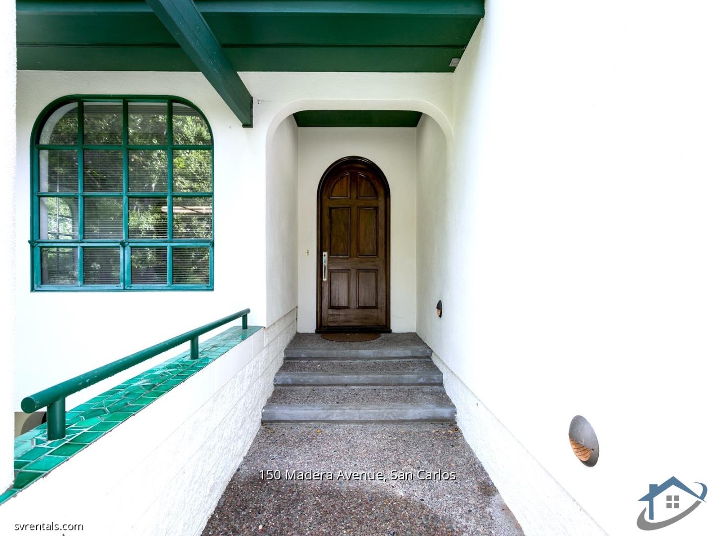 150 Madera Avenue San Carlos, CA 94070 - Photo 2 of 23 a front view of a house with large windows