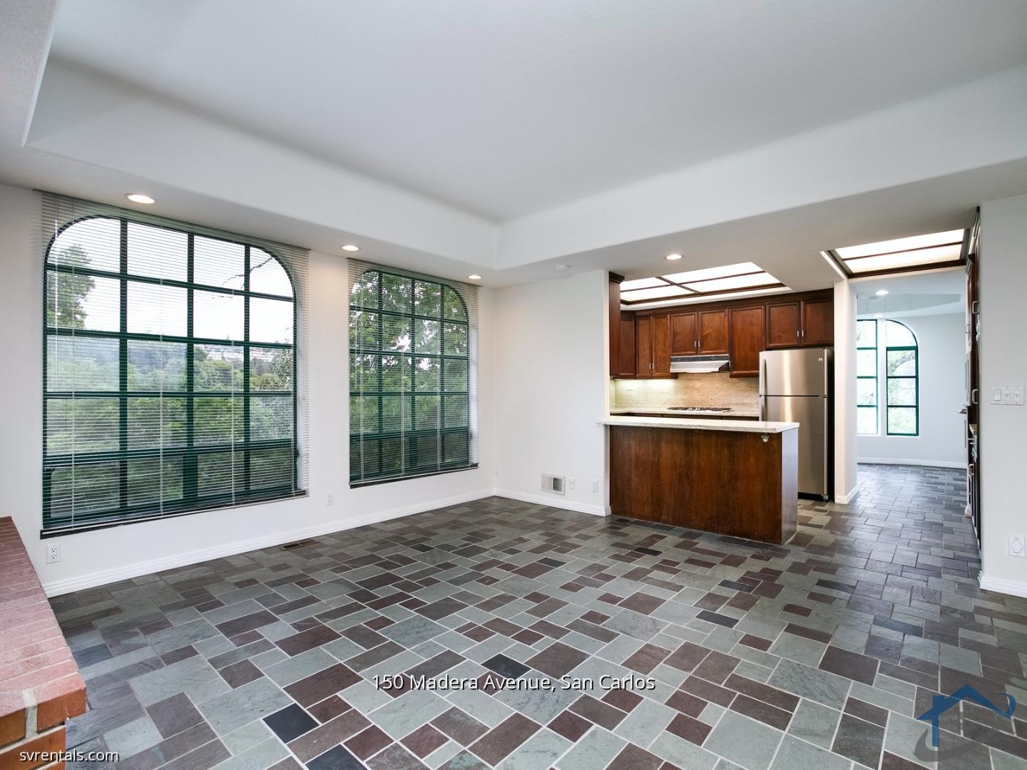 150 Madera Avenue San Carlos, CA 94070 - Photo 9 of 23 a view of a kitchen with a stove top oven and cabinets