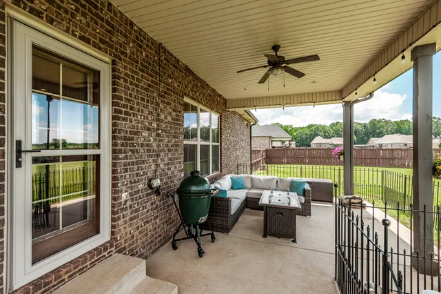a view of swimming pool with a yard