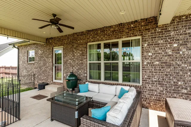 a view of outdoor space with swimming pool and green space