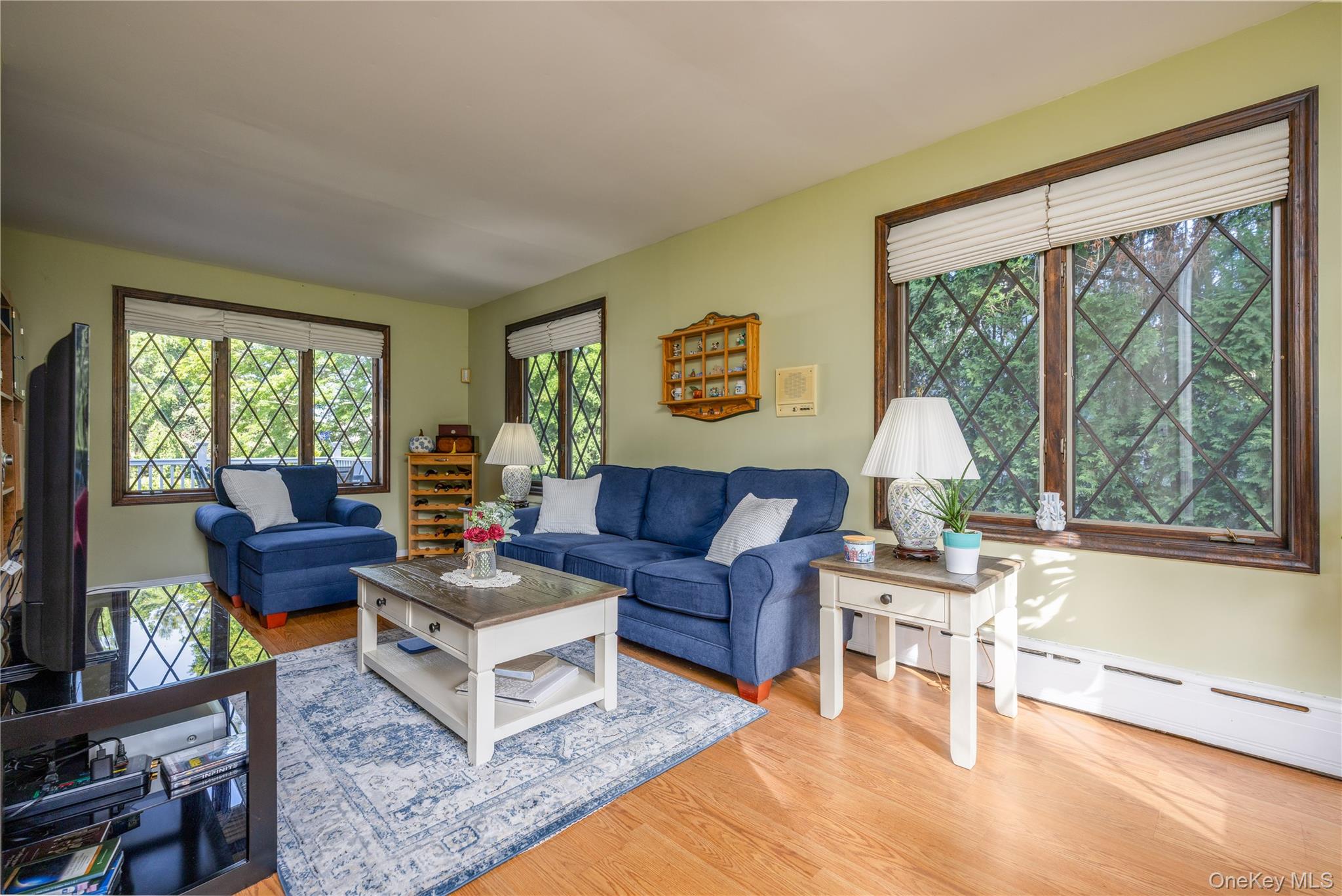 159 Fenimore Road New Rochelle, NY 10804 - Photo 7 of 37 Family room showcasing the modern gable windows