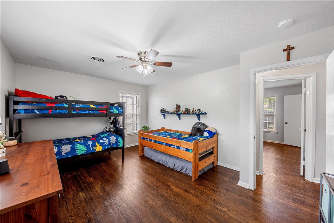 4701 Edmond Avenue Waco, TX 76710 - Photo 18 of 26 a living room with furniture and a wooden floor