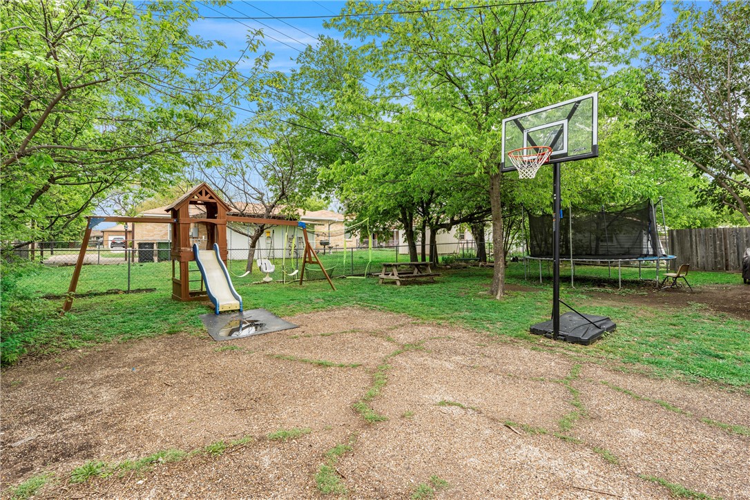 4701 Edmond Avenue Waco, TX 76710 - Photo 24 of 26 a house with trees in the background