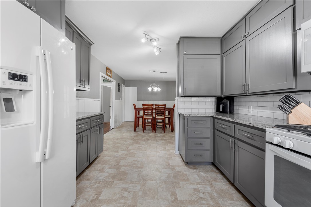 4701 Edmond Avenue Waco, TX 76710 - Photo 9 of 26 a kitchen with cabinets and chairs
