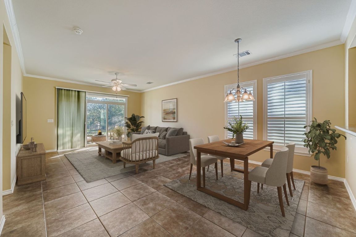 307 Mill Pond Path Georgetown, TX 78633 - Photo 4 of 26 Virtually staged family room and dining area