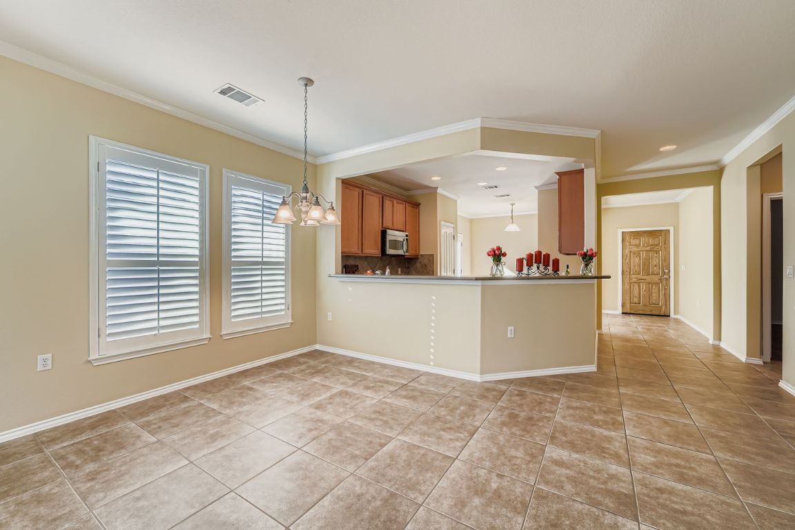 307 Mill Pond Path Georgetown, TX 78633 - Photo 8 of 26 Plenty of room for entertaining in the Dining area in the Family room.