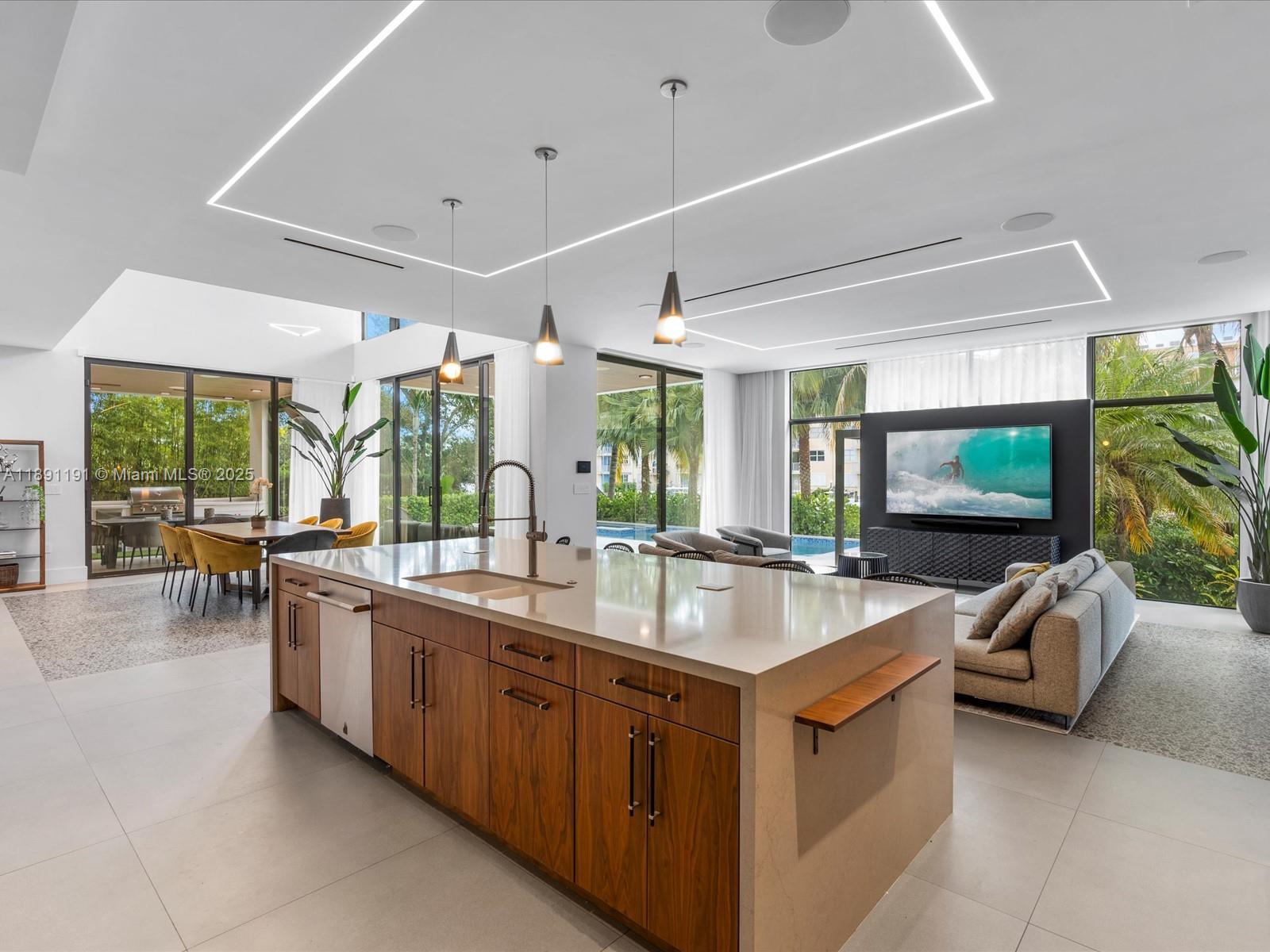 1736 Southeast 14th Street Fort Lauderdale, FL 33316 - Photo 14 of 54 a kitchen with sink stove and cabinets