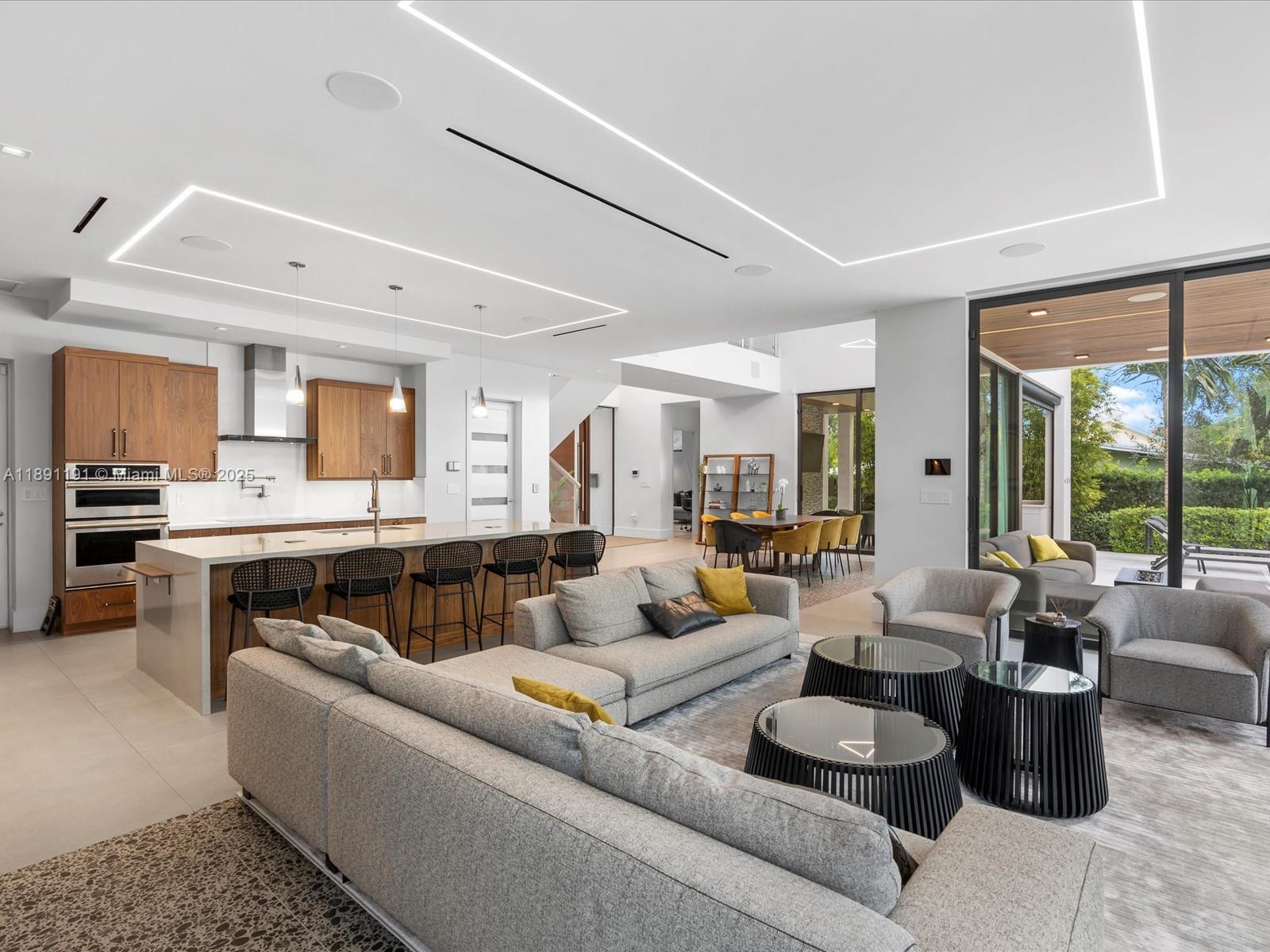 1736 Southeast 14th Street Fort Lauderdale, FL 33316 - Photo 18 of 54 a living room with furniture kitchen view and a large window