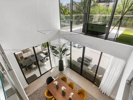 a bedroom with furniture and a flat screen tv