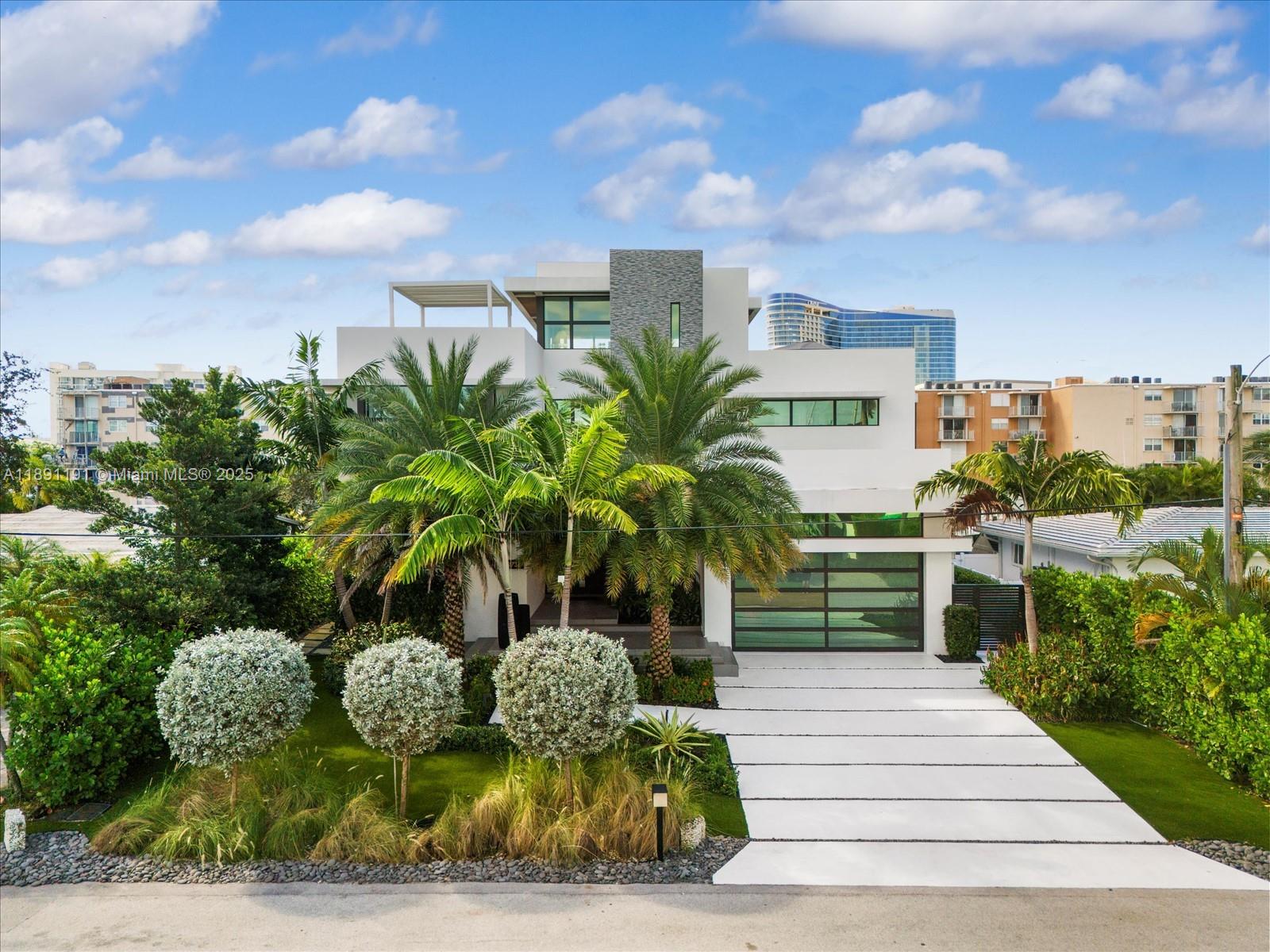 1736 Southeast 14th Street Fort Lauderdale, FL 33316 - Photo 2 of 54 a front view of a house with garden