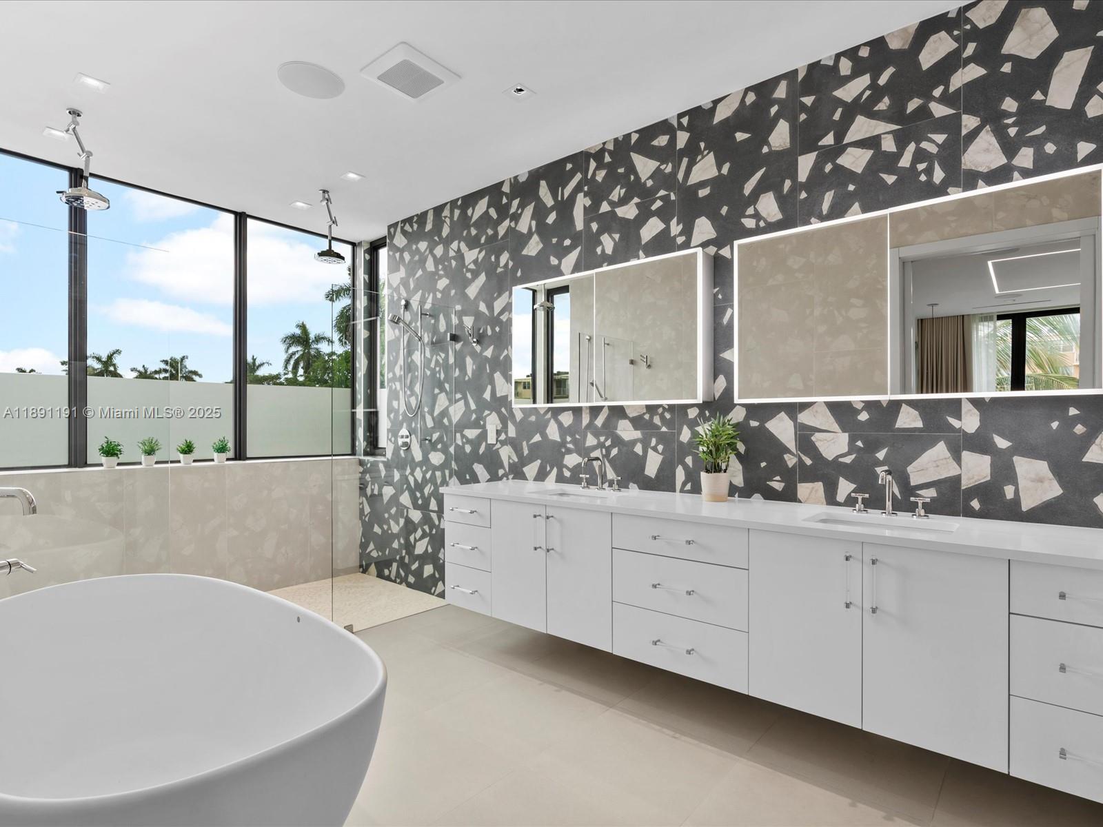 1736 Southeast 14th Street Fort Lauderdale, FL 33316 - Photo 27 of 54 a bathroom with a bathtub and a sink