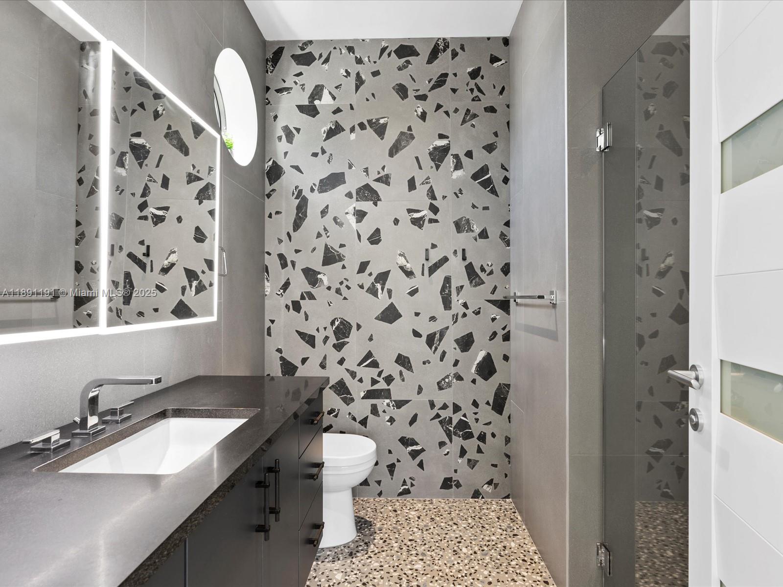 1736 Southeast 14th Street Fort Lauderdale, FL 33316 - Photo 33 of 54 a bathroom with a sink toilet and shower