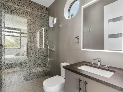 a view of roof deck with patio