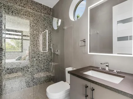 a view of swimming pool with seating area