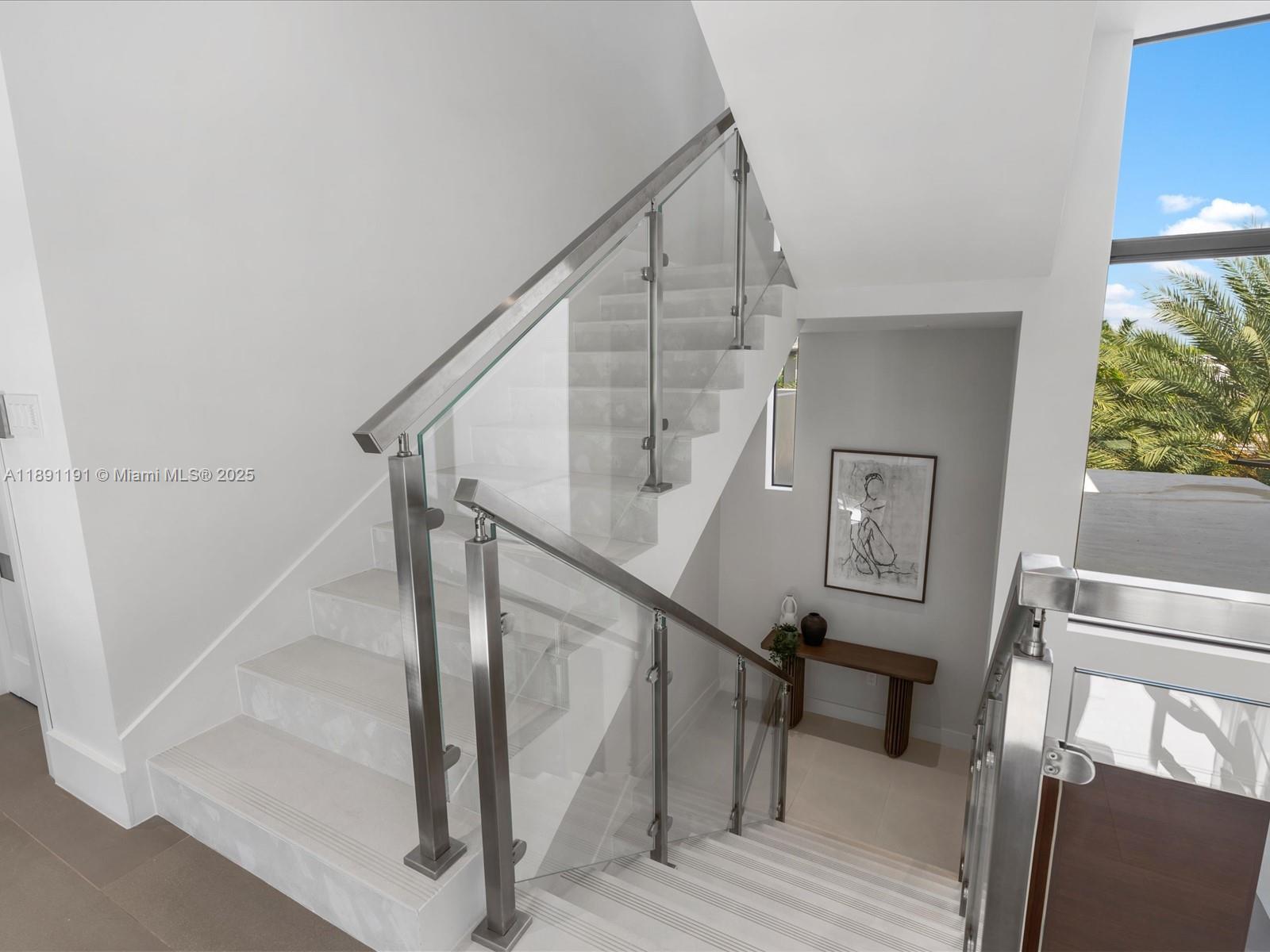 1736 Southeast 14th Street Fort Lauderdale, FL 33316 - Photo 43 of 54 a view of entryway and hall with wooden floor