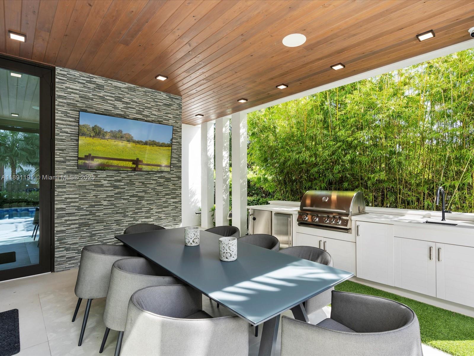 1736 Southeast 14th Street Fort Lauderdale, FL 33316 - Photo 47 of 54 a outdoor dining space with furniture and outdoor view