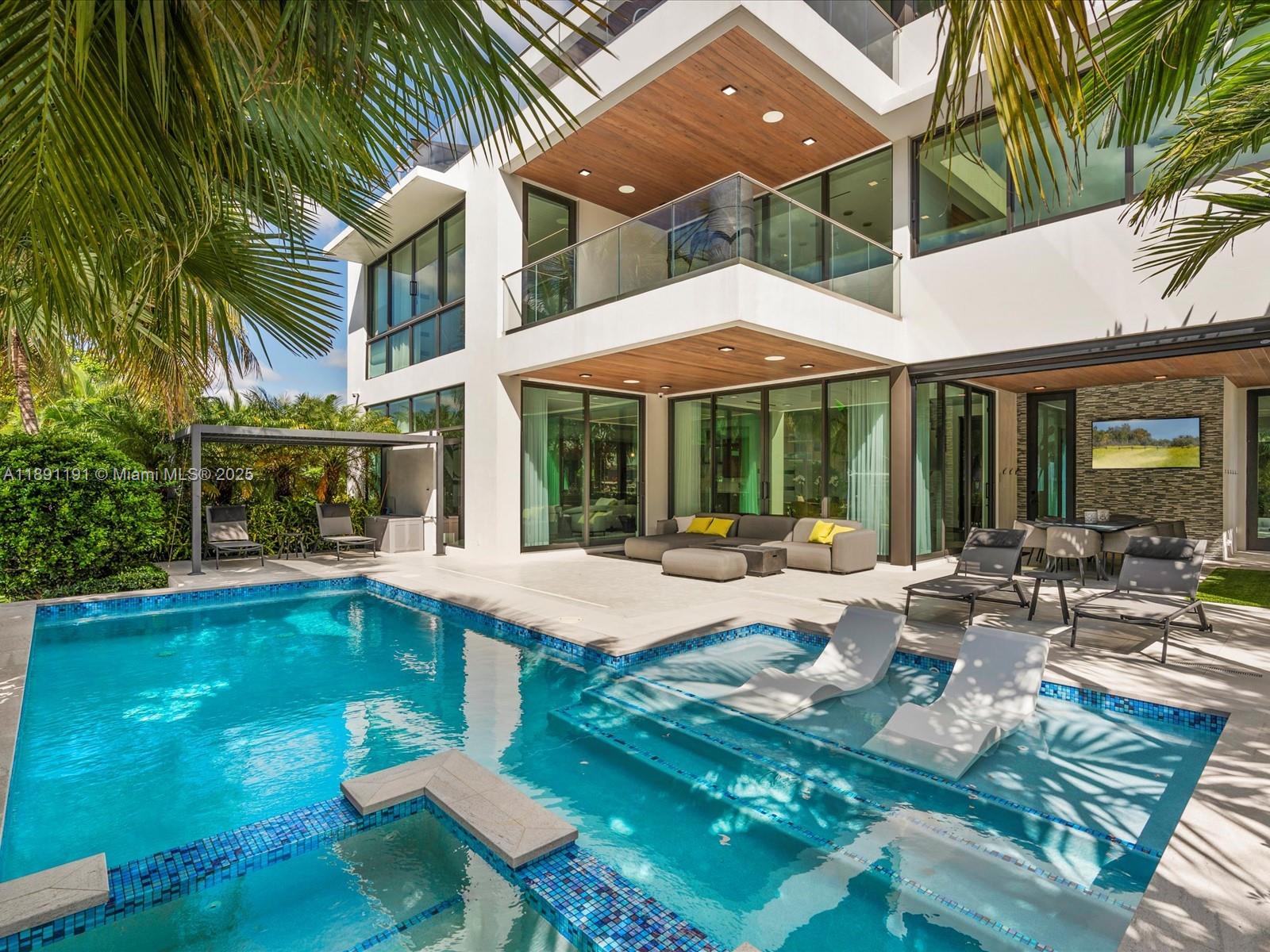 1736 Southeast 14th Street Fort Lauderdale, FL 33316 - Photo 48 of 54 a view of a house with swimming pool and sitting area