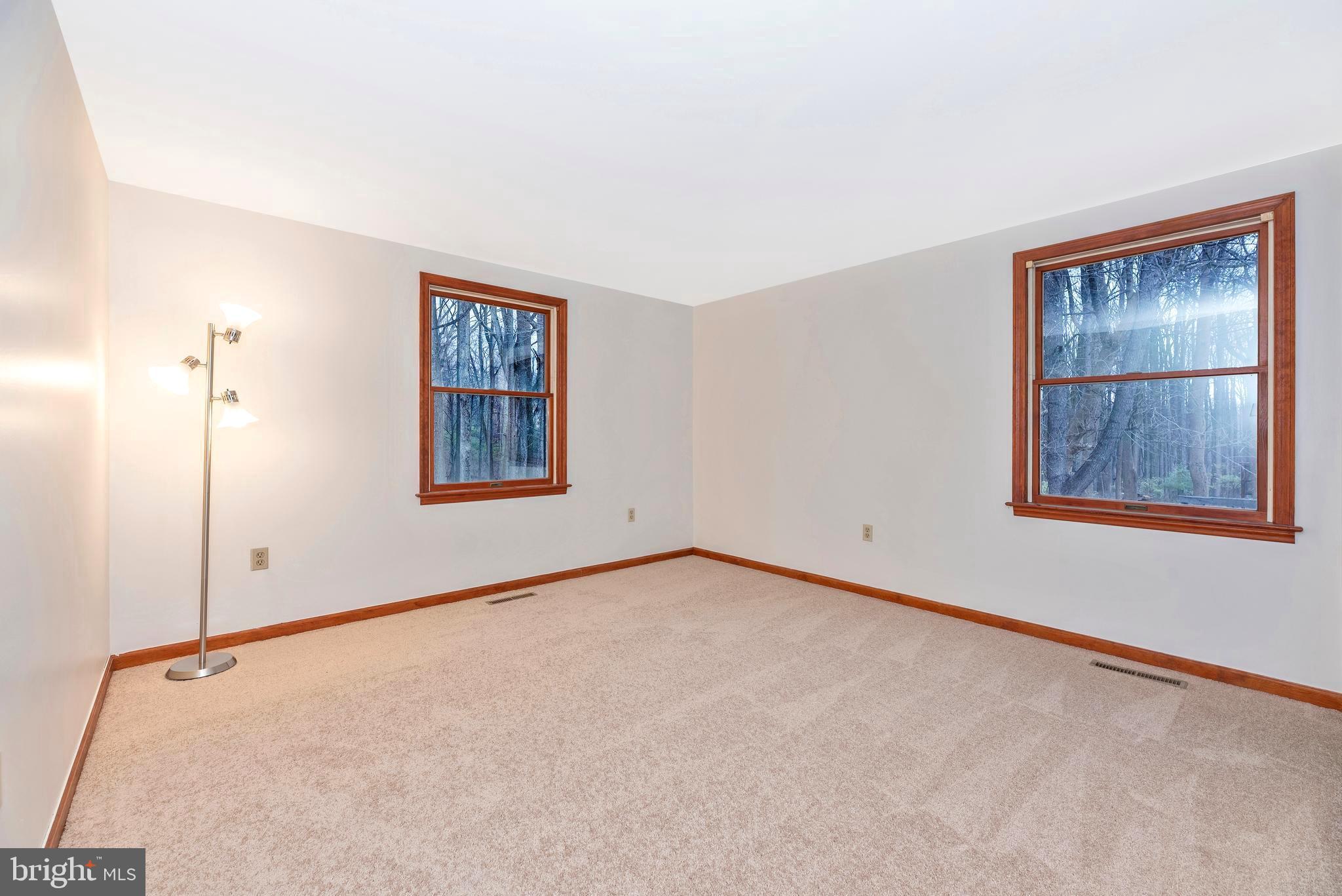 8009 Edgewood Church Road Frederick, MD 21702 - Photo 11 of 42 an empty room with windows and closet