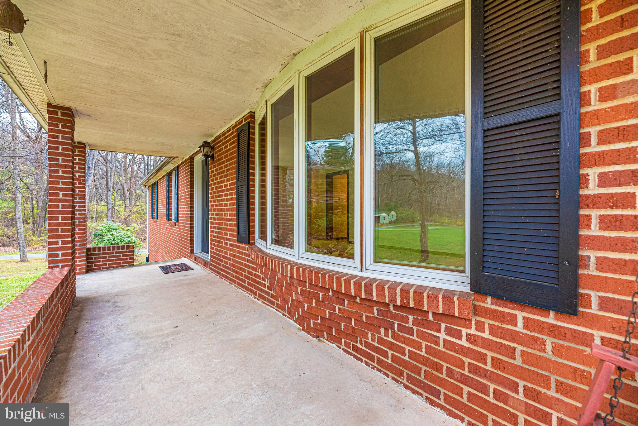 8009 Edgewood Church Road Frederick, MD 21702 - Photo 25 of 42 a view of a house with a porch