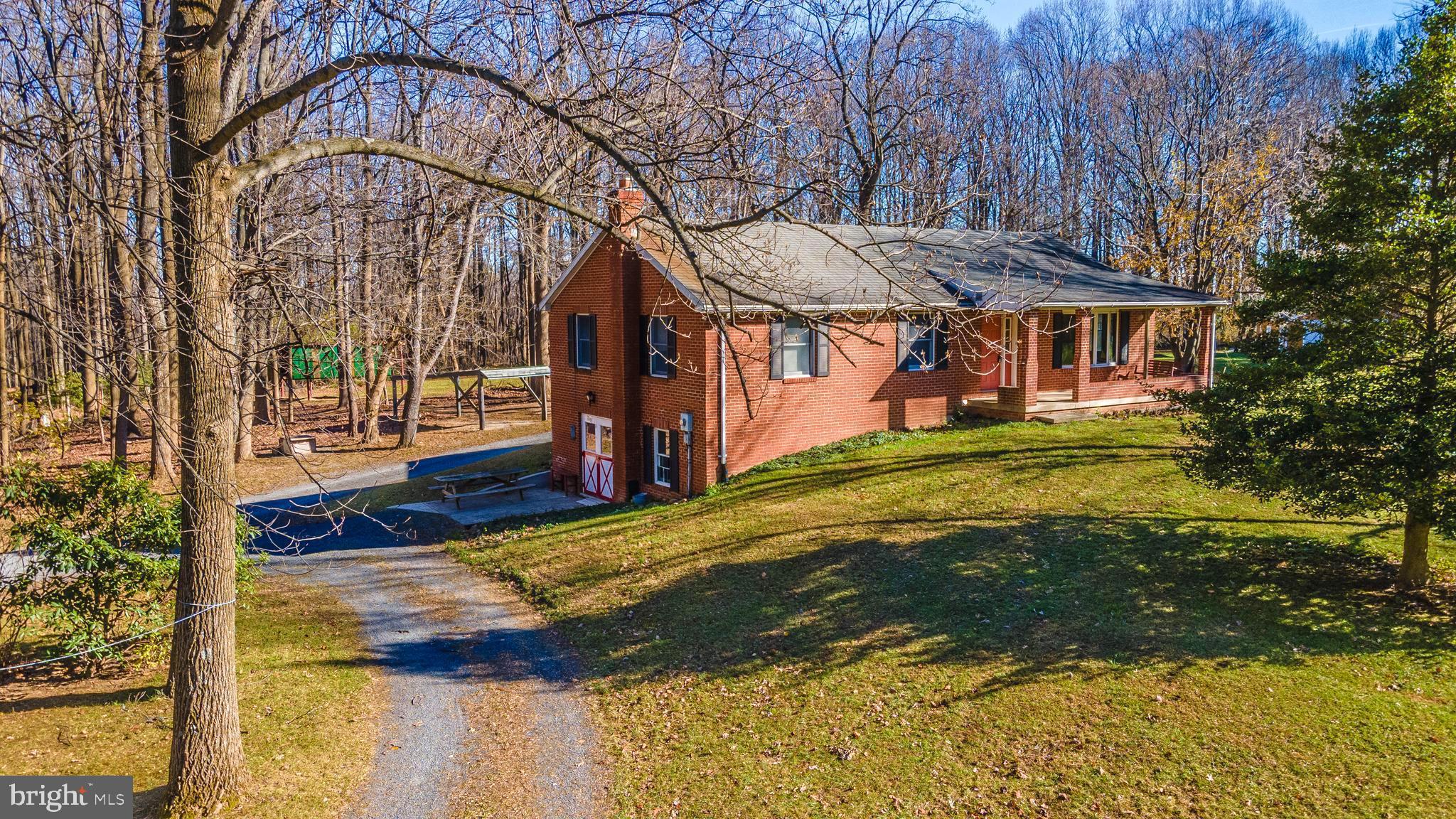 8009 Edgewood Church Road Frederick, MD 21702 - Photo 28 of 42 a view of a house with a yard