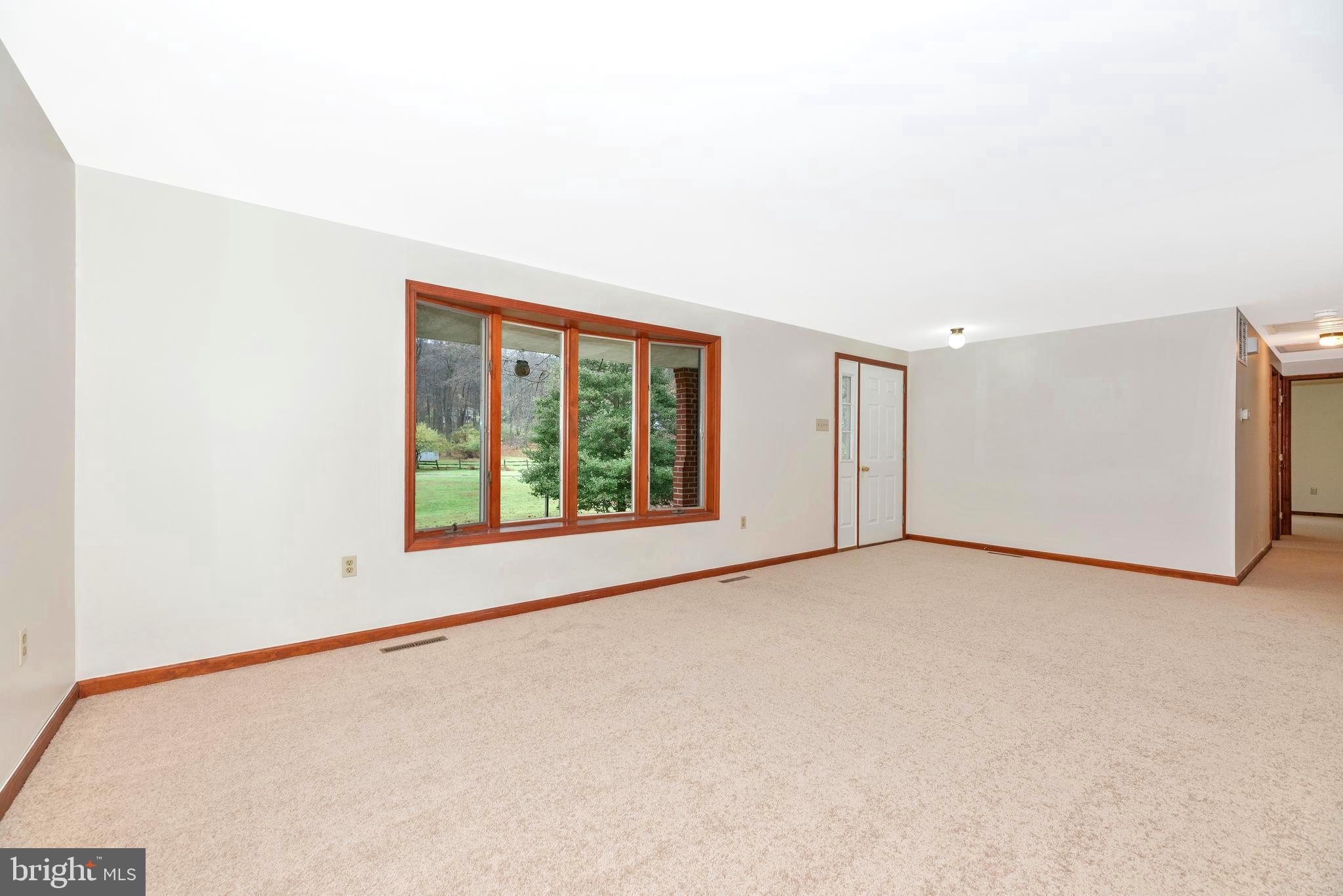 8009 Edgewood Church Road Frederick, MD 21702 - Photo 29 of 42 a view of an empty room with a window