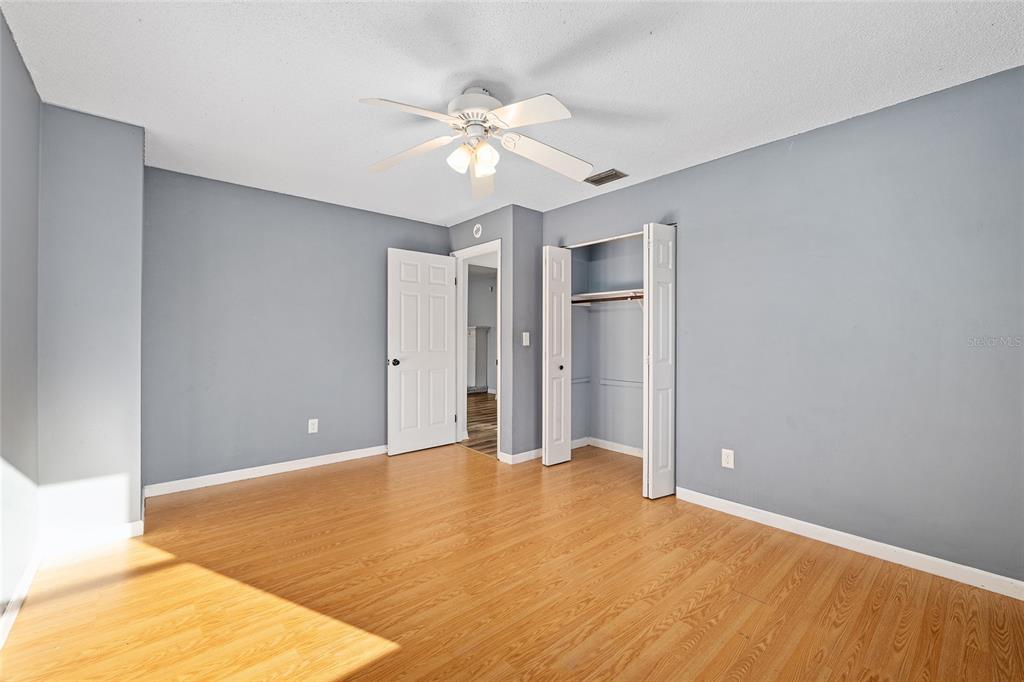 10577 Southeast 101st Avenue Road Belleview, FL 34420 - Photo 14 of 17 a view of an empty room with wooden floor