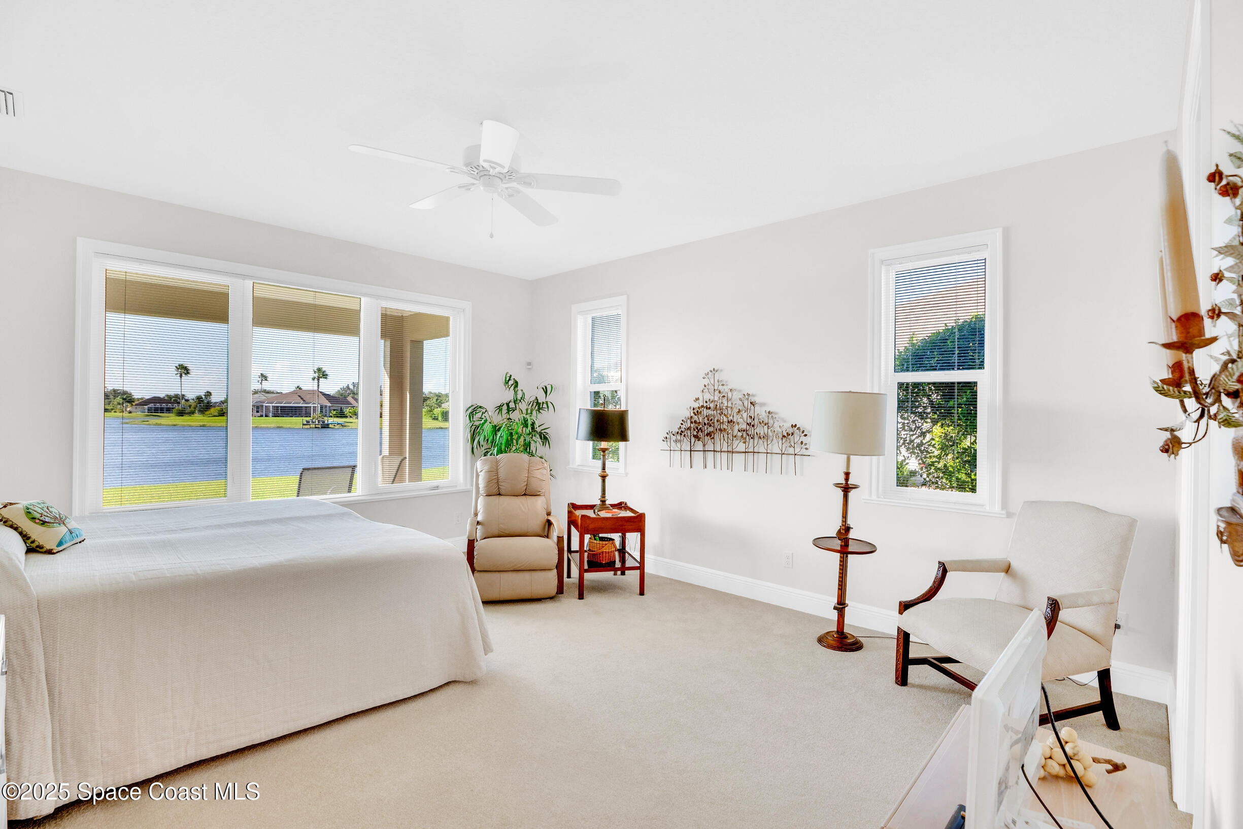 307 Yearling Trail Sebastian, FL 32958 - Photo 22 of 40 a bedroom with furniture and a large window