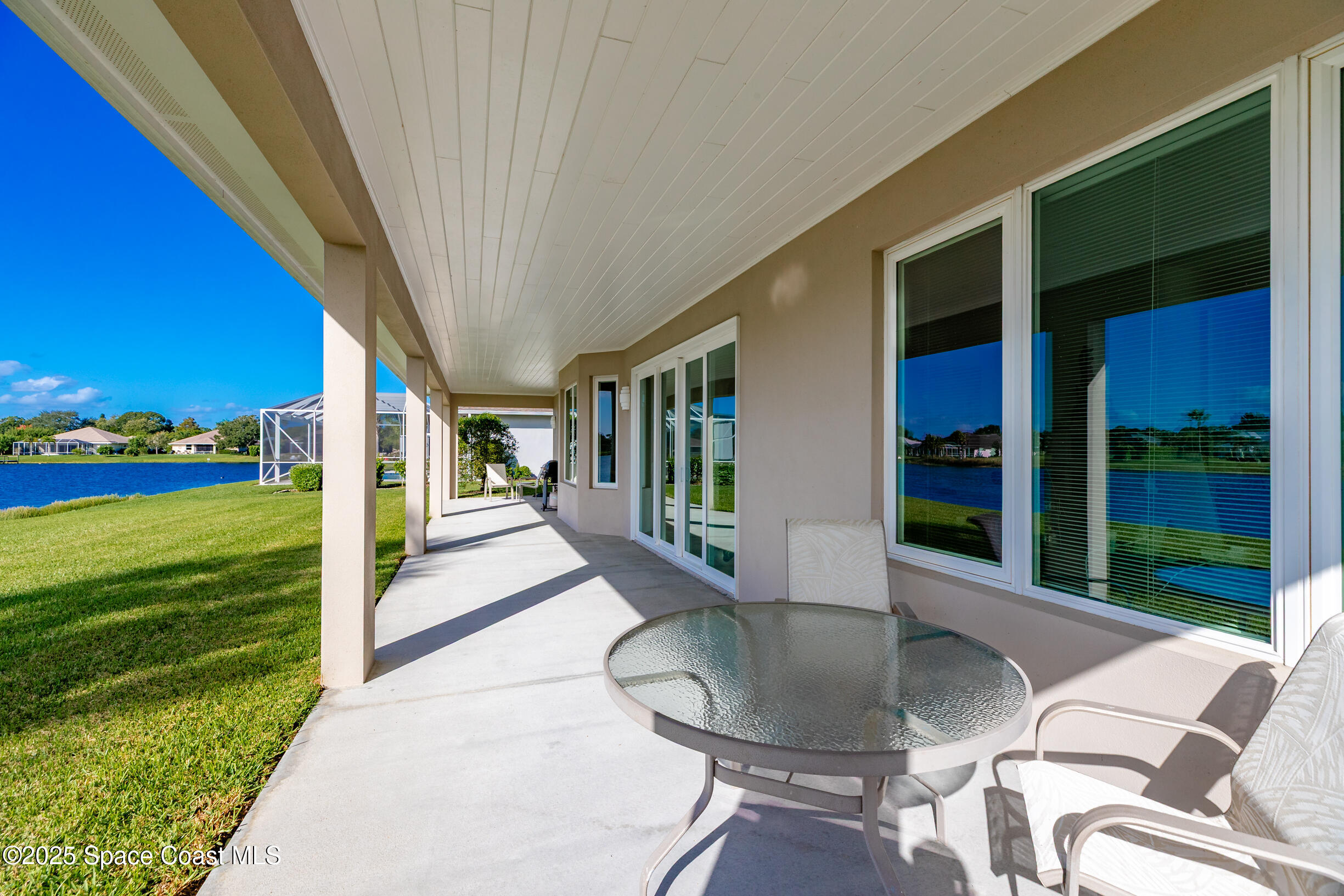 307 Yearling Trail Sebastian, FL 32958 - Photo 32 of 40 a view of a porch with furniture and garden