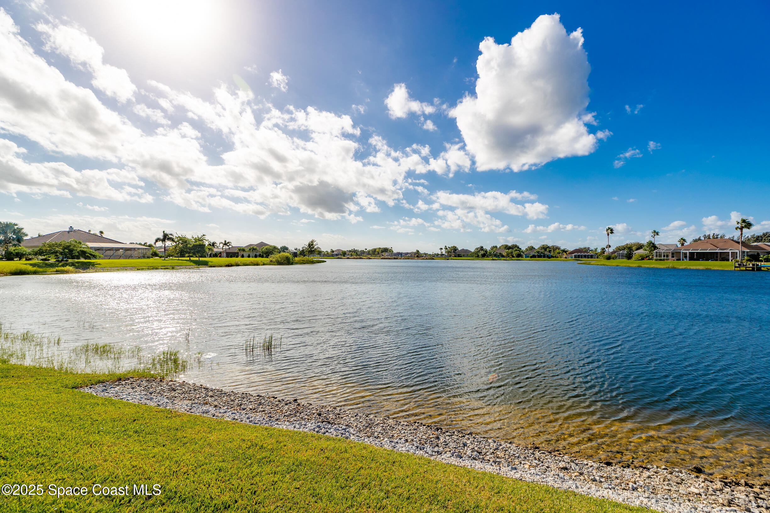 307 Yearling Trail Sebastian, FL 32958 - Photo 36 of 40 a view of a lake from a yard