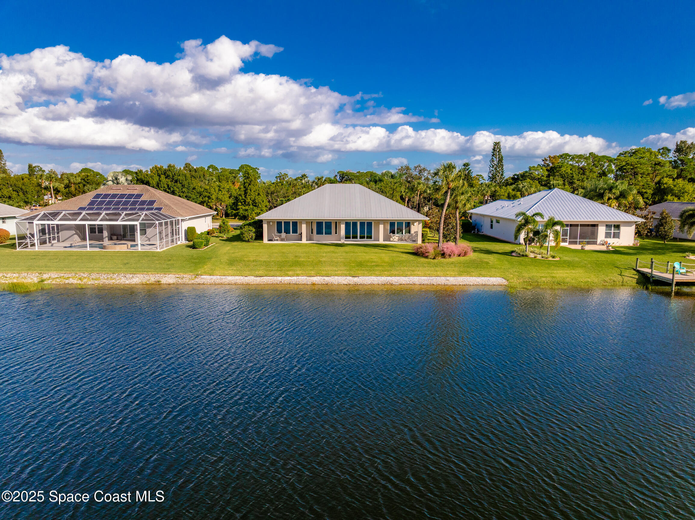 307 Yearling Trail Sebastian, FL 32958 - Photo 40 of 40 a view of a house with pool and a yard