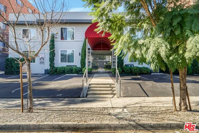 a sign board on the side of the road