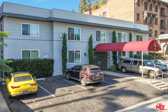 a car parked in front of a house
