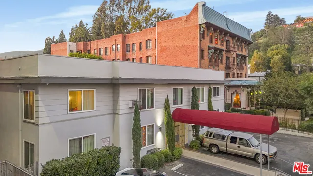 a car parked in front of a building